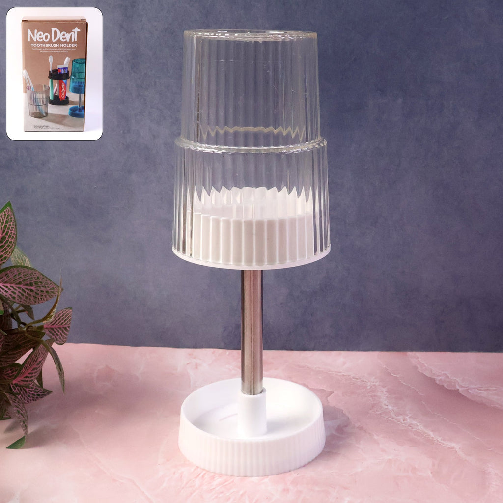 Close-up of rotating toothbrush holder stand with multi-section organizer tray