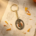 Lord Krishna metal keychain with antique oval frame design