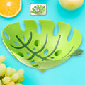 Leaf-shaped plastic fruit basket with ventilated leaf design for fresh produce