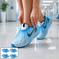 Blue disposable shoe covers with elastic fit for hygiene and protection.
