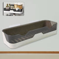 Adhesive shower caddy mounted on a bathroom wall, showcasing easy installation.