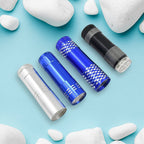 Front view of the Poravar Mini 9 LED Pocket Torch, highlighting its compact design.