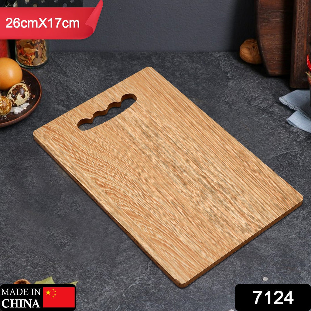 Handy wooden kitchen board with finger hole for easy storage.