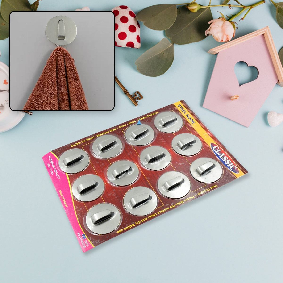 Set of 12 self-adhesive steel wall hooks for home organization.