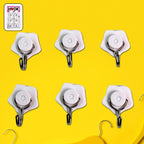 A set of six colorful self-adhesive wall hooks displayed against a clean background.
