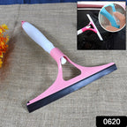 User demonstrating streak-free cleaning on a glass window with the spray brush.