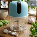 Compact USB rechargeable mini electric garlic chopper with three sharp blades.