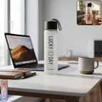 Elegant frosted glass water bottle showcasing a stylish design