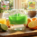Manual citrus juicer with splash cover squeezing lemon juice efficiently