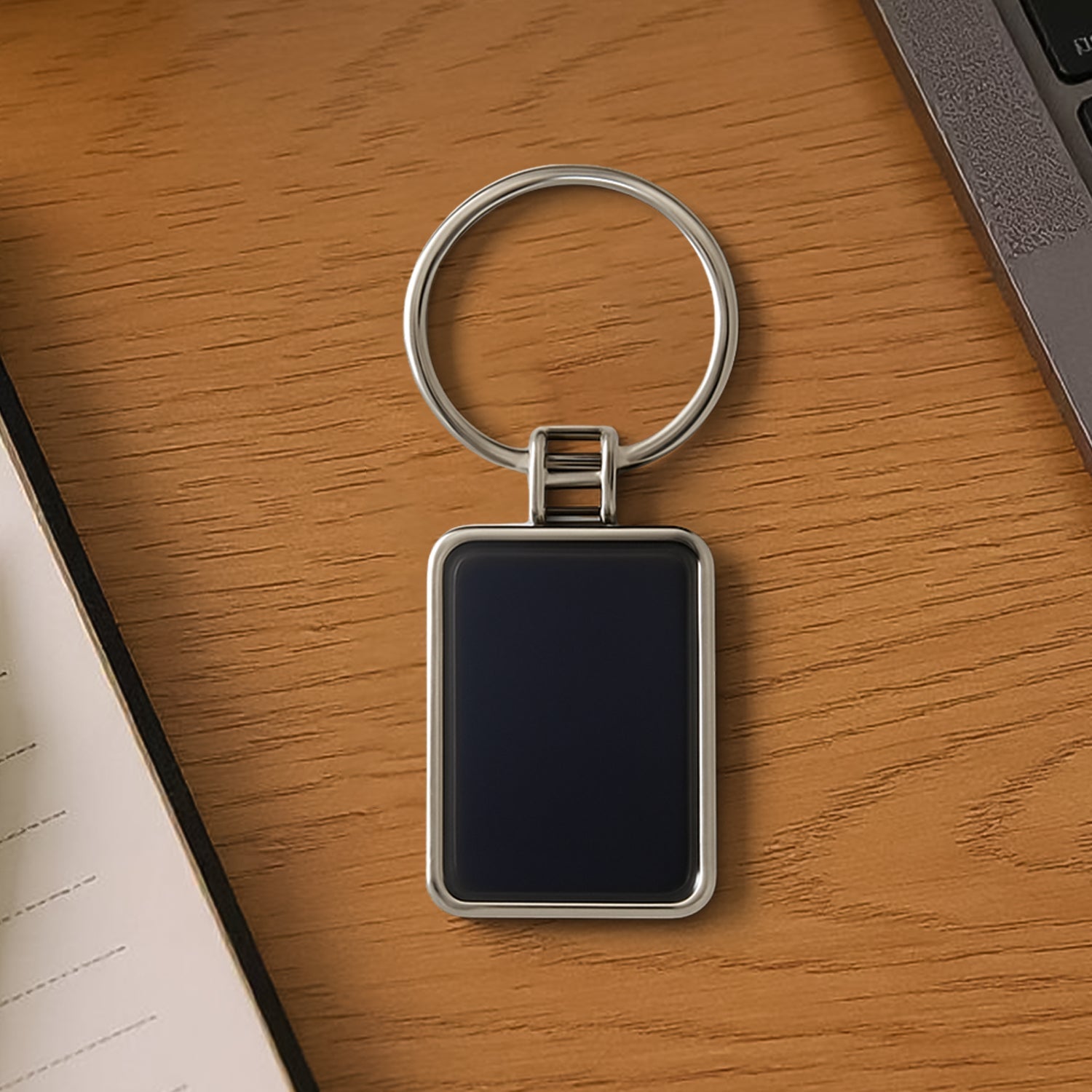Premium rectangular black and silver metal keychain with glossy finish