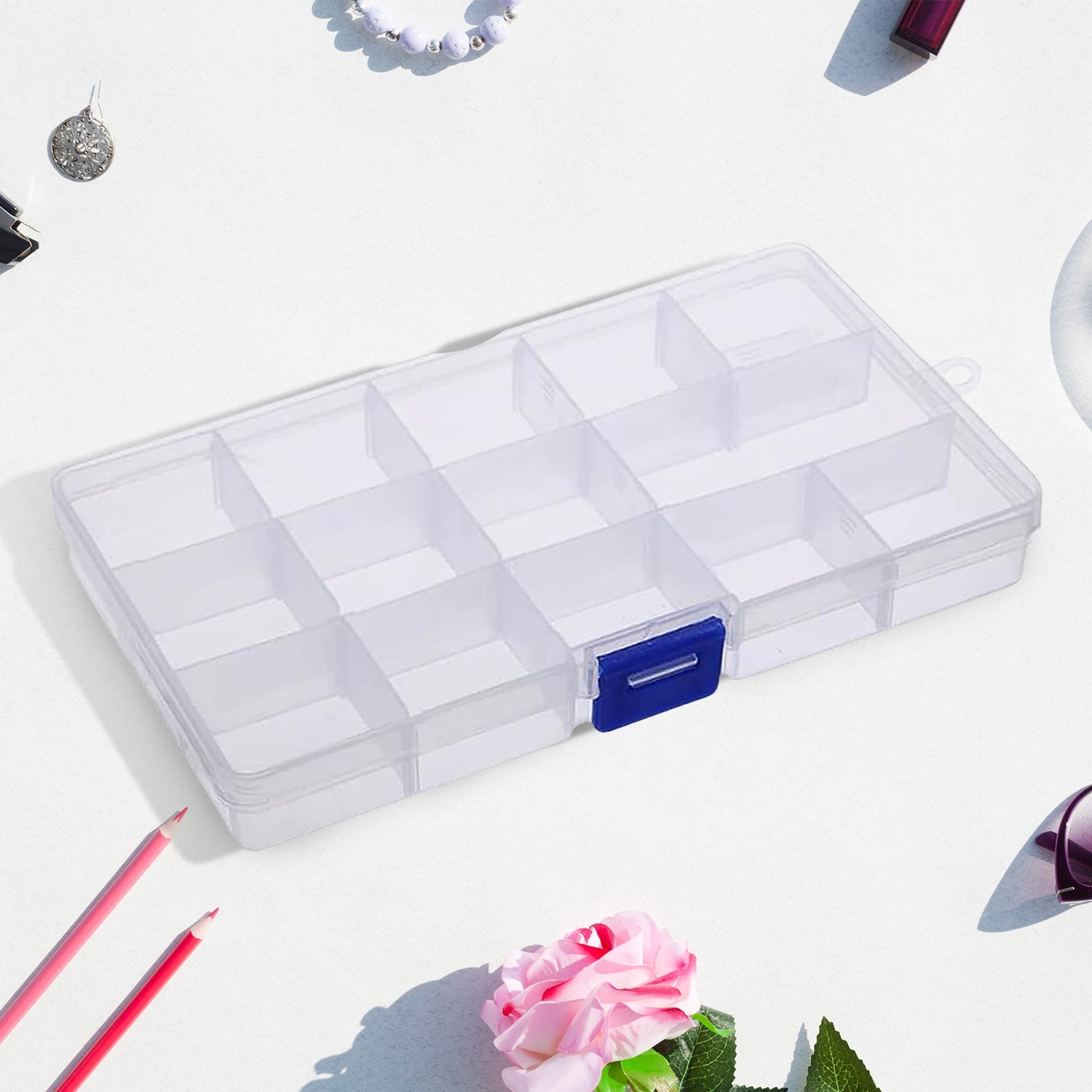 15-grid clear plastic jewellery organizer box with adjustable dividers, perfect for storing small items.