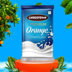 Vibrant orange chocolate compound slab for confectionery.