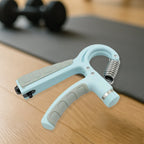 XcelCraft hand grip strength trainer with adjustable resistance.