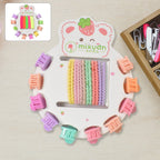 Colourful assortment of kids hair accessories, including clips and bands.