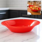 Top view of vibrant red Plastic Marin serving bowl with oval design