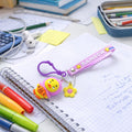 Rainbow Duck Keychain with soft silicone rainbow strap and cartoon duck pendant