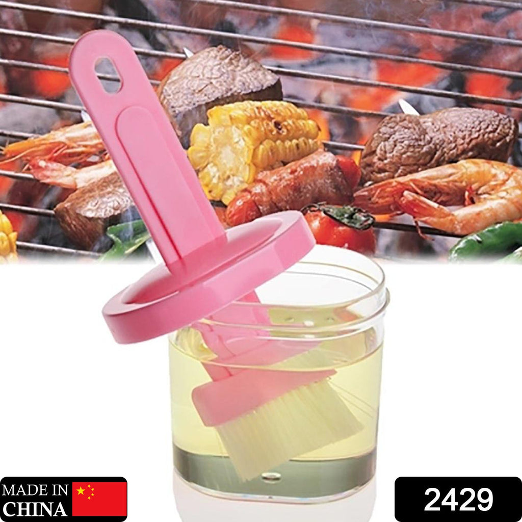 Front view of the plastic spatula with holder, showcasing its durability.