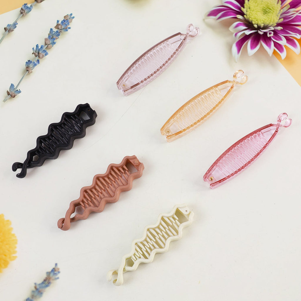 Hair clip in plastic material providing a secure hold on hair