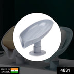 Side view of a green leaf shape soap tray with a suction cup, showcasing its draining design.