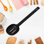 Ergonomic silicone cooking spoon for daily use.