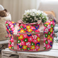 A stylish black foldable travel bag with an expandable bottom layer, perfect for weekend trips.