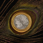 Intricate Lakshmi Ganesh embossed design on decorative religious coin