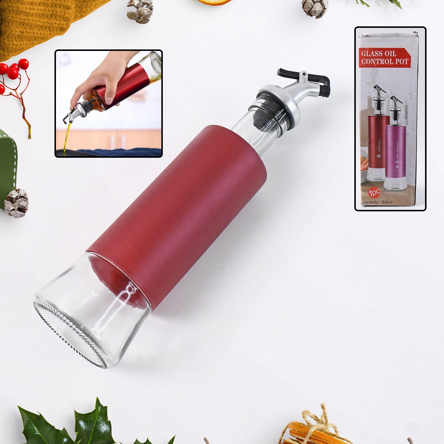 Close-up of glass oil dispenser showing durable plastic covering and golden spout