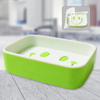 Portable soap container open showing smiley face design