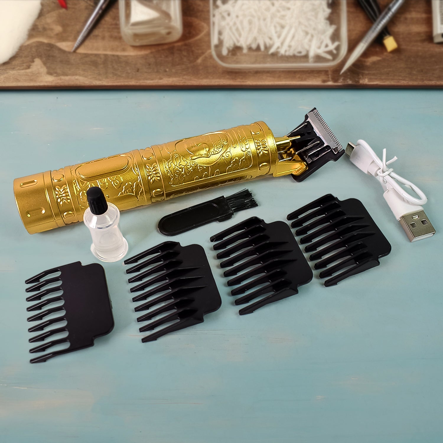 Close-up of the self-sharpening stainless steel blades and protective shield on the body trimmer.