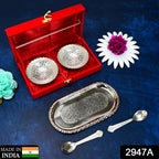 Overhead view of the complete silver plated brass serving set, showcasing its design and arrangement on a tray.