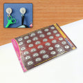 36-piece set of capsule-shaped stainless steel self-adhesive wall hooks.