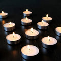 A collection of smokeless tealight candles arranged for festive home decor.