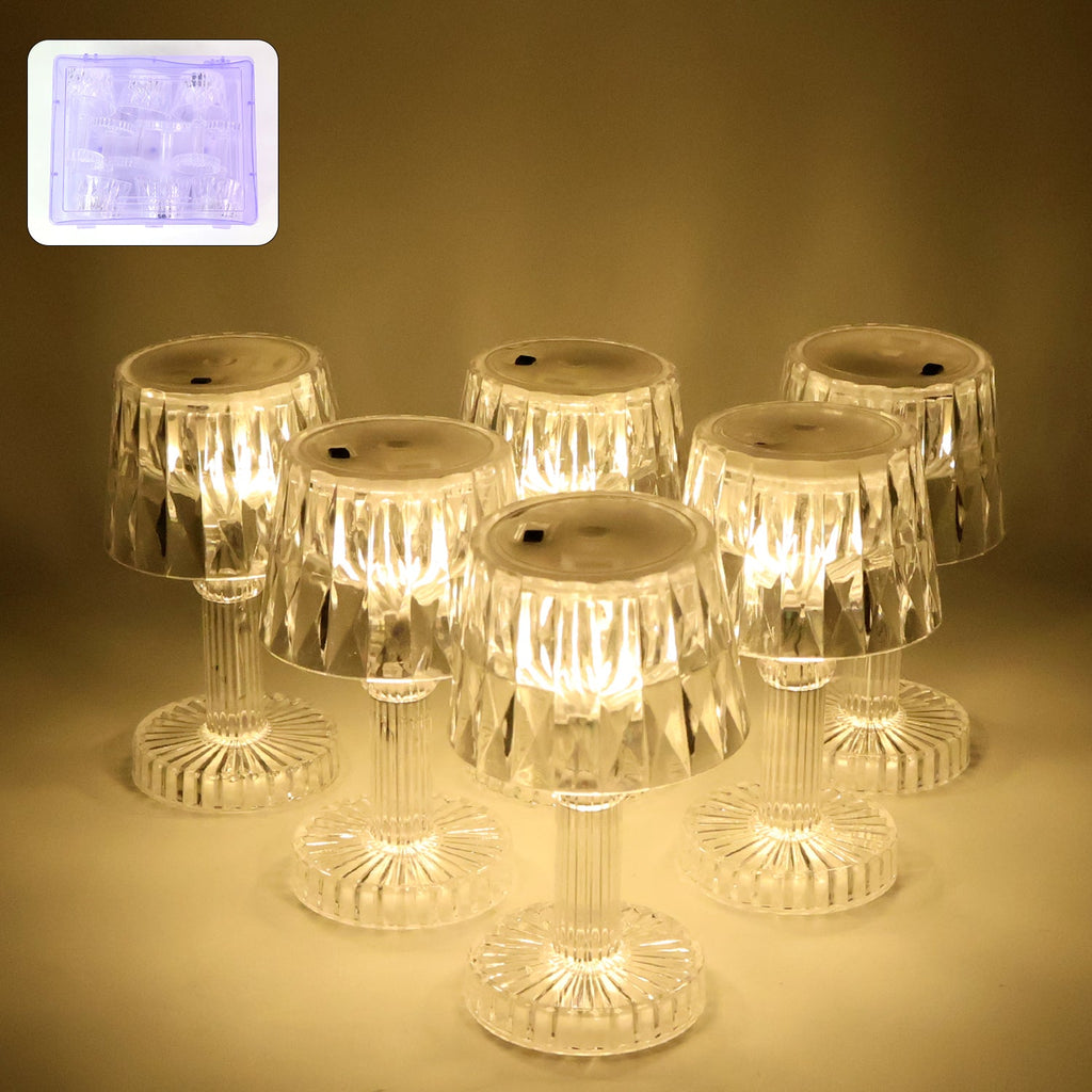 Set of six battery operated LED mini table lamps with crystal-effect shades creating a decorative glow.