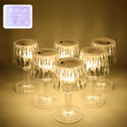 Set of six battery operated LED mini table lamps with crystal-effect shades creating a decorative glow.