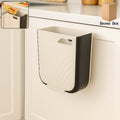 Hanging trash can in a collapsed state, showcasing its space-saving design.