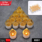 Overhead shot of a cluster of glowing Flameless LED Tea Light Candles creating a soft ambiance.