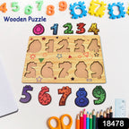 Overhead view of a wooden number puzzle with all pieces in place.