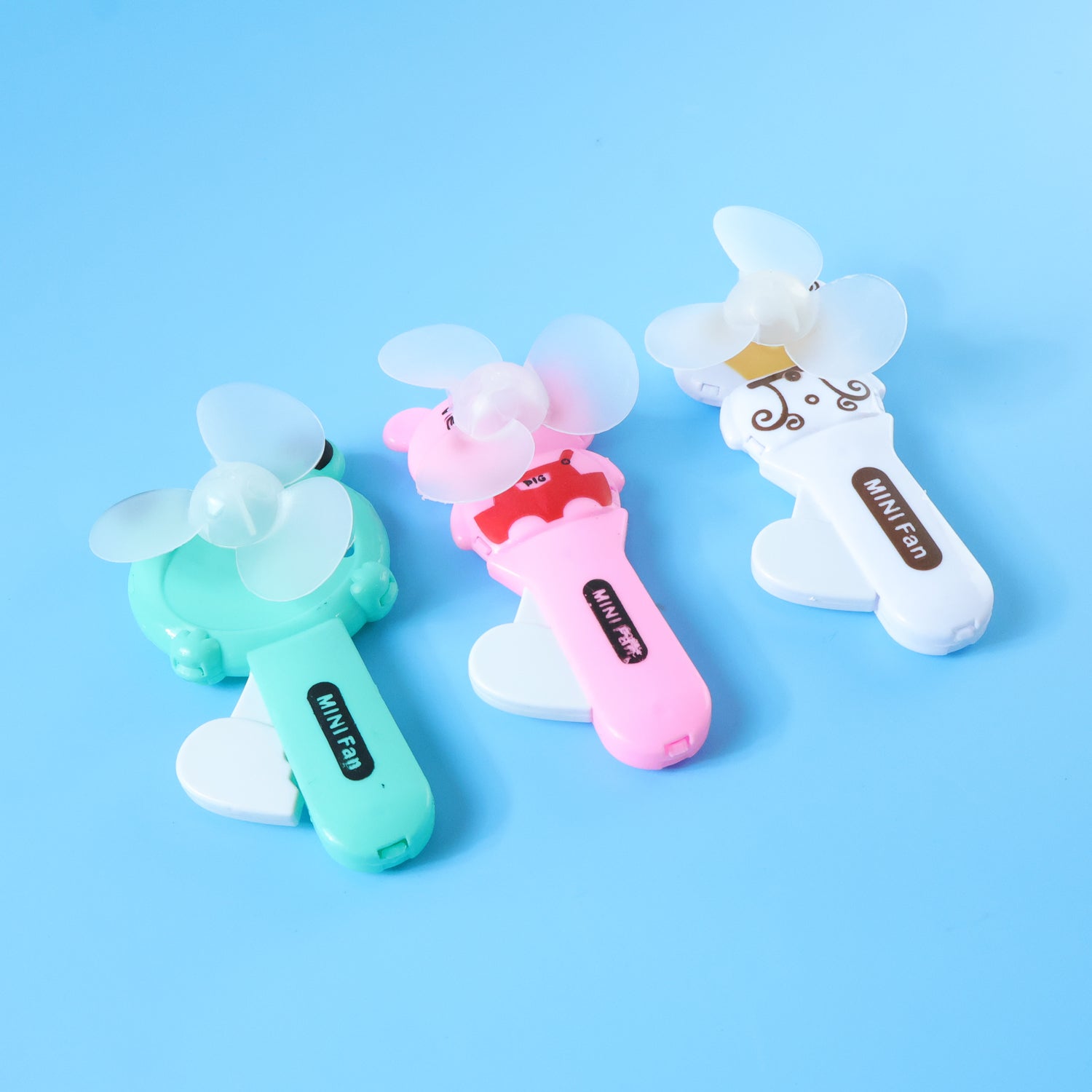 Mini handheld fan with cartoon design for personal cooling