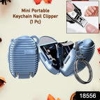 Compact keychain nail clipper attached to a set of keys for portability.
