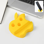 Multi-functional apple shape phone stand with pen holder on workspace