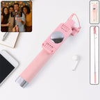 Wired selfie stick with rearview mirror and shutter button in pastel pink color