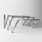 Stainless steel wall-mounted folding clothes drying rack in expanded position