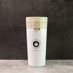 Close-up of  stainless steel vacuum insulated coffee flask showing specifications