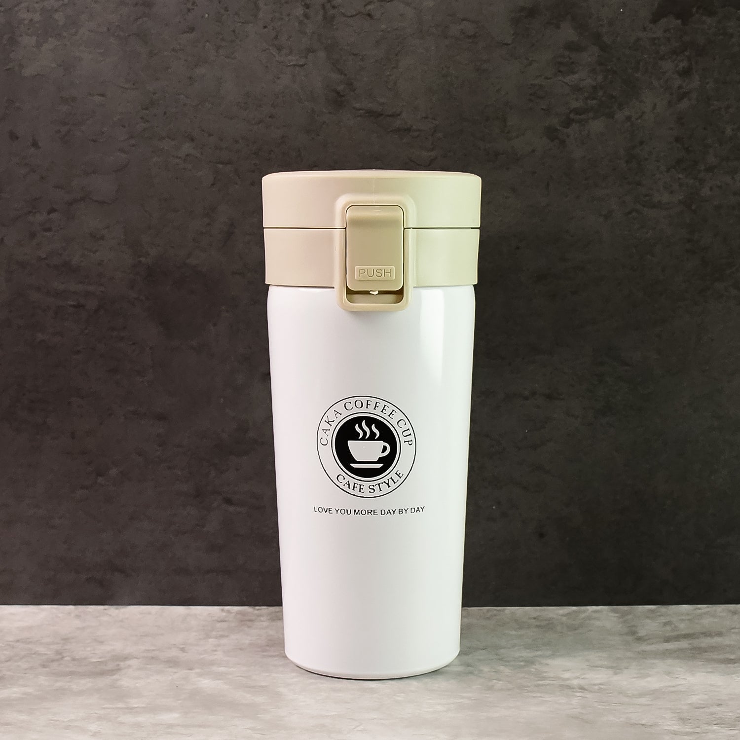 Close-up of  stainless steel vacuum insulated coffee flask showing specifications