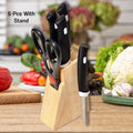 Black kitchen knife set including four knives and scissors with wooden block for storage