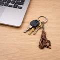 Bal Krishna Makhan Chor keychain with intricate antique gold metal finish