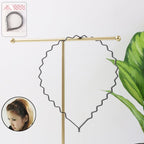 Set of six metal zigzag hair bands with black wavy design