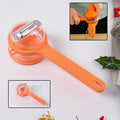 Stainless steel peeler with container on kitchen counter