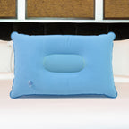 Inflatable travel pillow showing its compact size and comfortable design