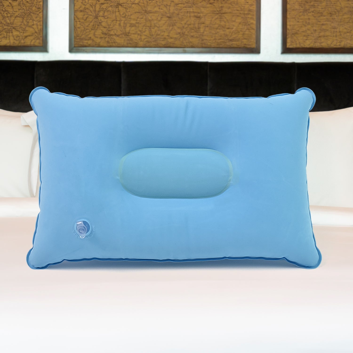 Inflatable travel pillow showing its compact size and comfortable design